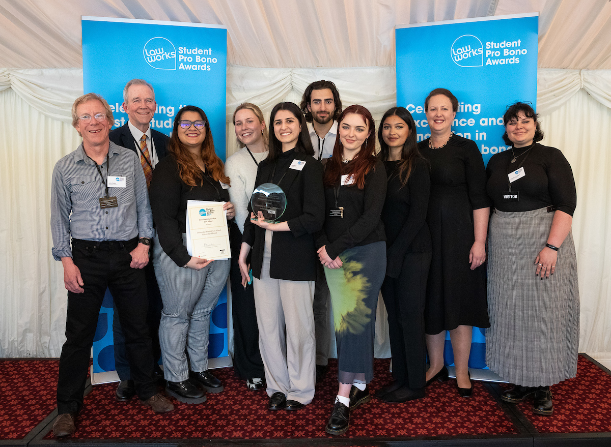 The University of Bristol Law Clinic Director John Peake together with Law Clinic student representatives, alongside Chair of LawWorks Alasdair Douglas, and the Attorney General Rt Hon Victoria Prentis KC MP, at the awards ceremony at the House of Lords, May 2024.